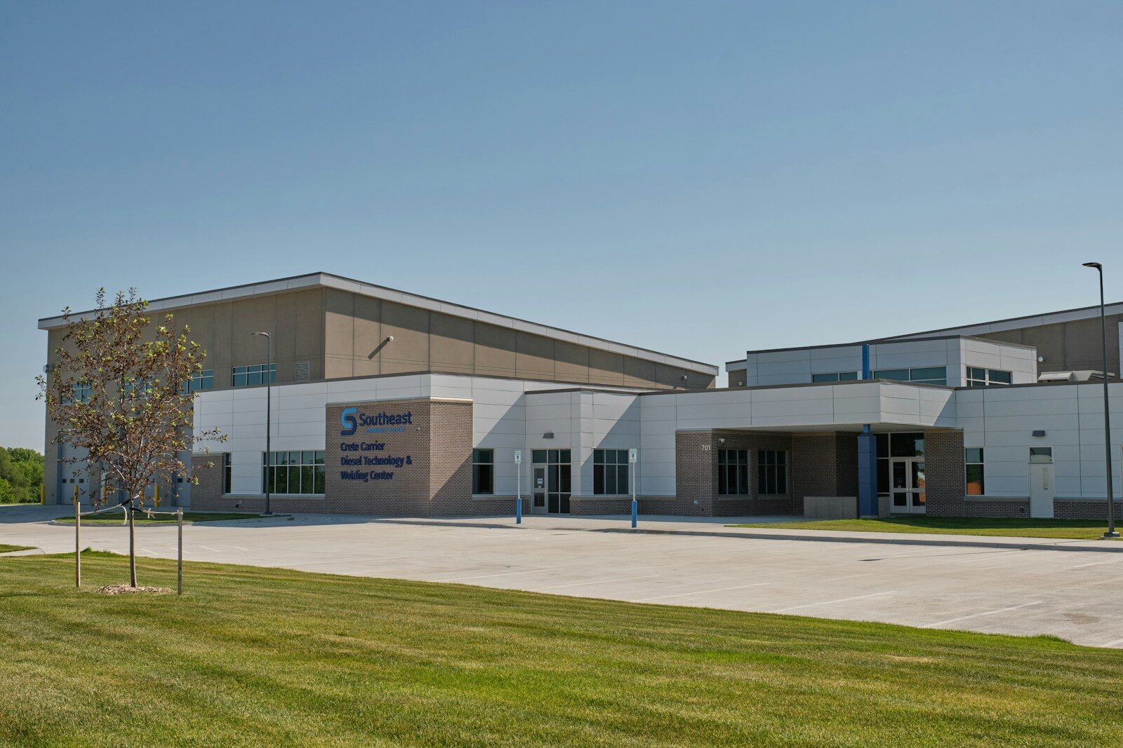 a large building with a tree in front of it